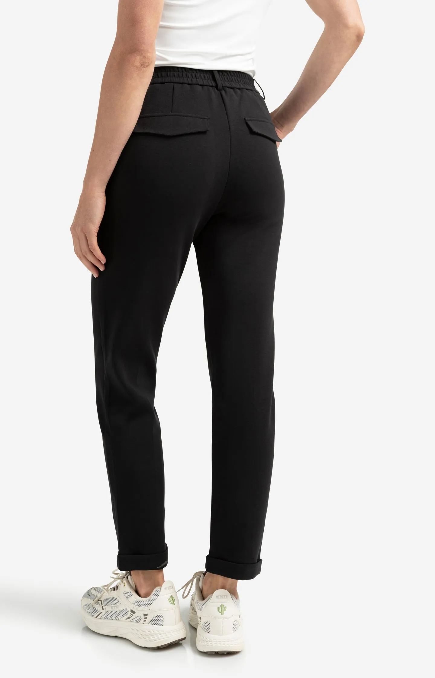 Black scuba trousers with straight legs and flap pockets