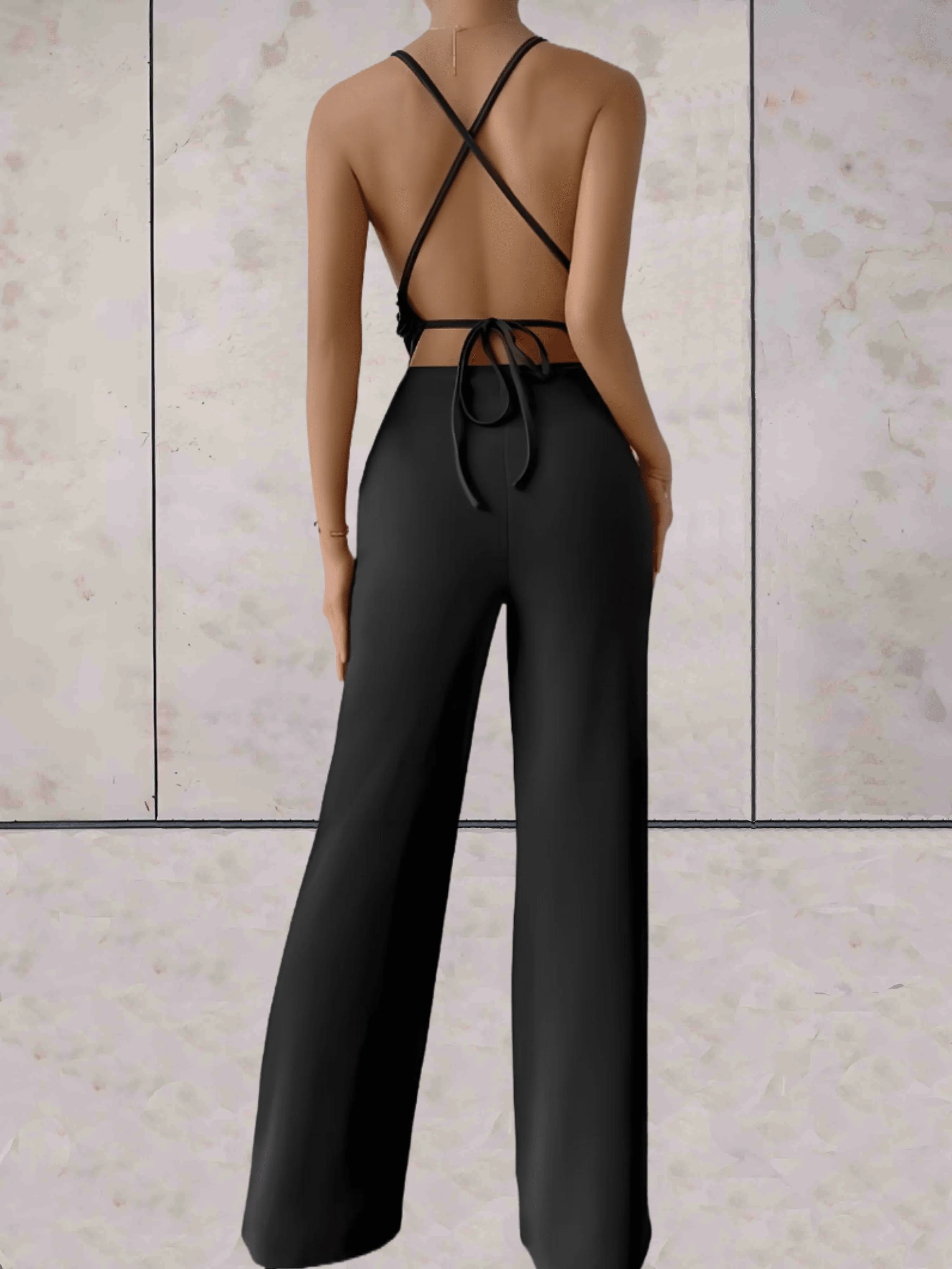 Brianna | Schicker Jumpsuit mit tiefem V-Ausschnitt, ärmellos, rückenfrei und weitem Bein